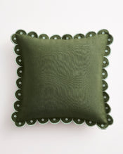 The Olive & Sage 100% French Flax Linen Arch Cushion Cover by Bed Threads features a square olive green design with an arch border, scalloped edges, and circular cutout pattern—shown on a plain white background. - view
