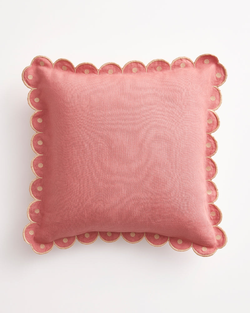 The Pink Clay & Terracotta 100% French Flax Linen Arch Cushion Cover by Bed Threads features scalloped edges, an embroidered arch border with cutout circles, and a zip closure. Shown on a white background.