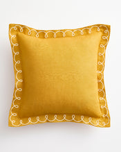 The Bed Threads Turmeric & Crème 100% French Flax Linen Swirl Cushion Cover features a square mustard yellow design with white embroidered loop and swirl edges, shown on a white background. - view